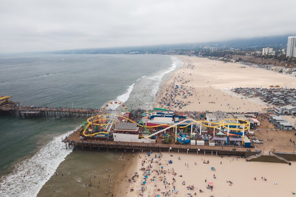 an aerial shot of the santa monica pier in california