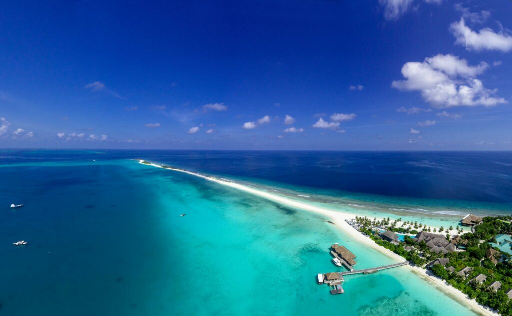 aerial photography of resort beside ocean